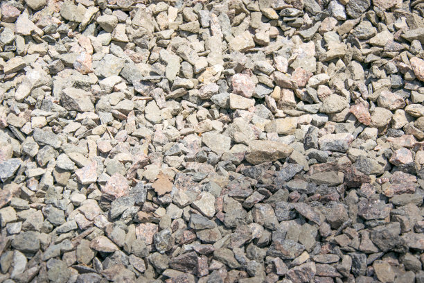 一堆灰色和棕色碎石的特写照片图片下载