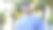一个黑发男子站在树林里，带着悲伤的表情看着镜头图片下载