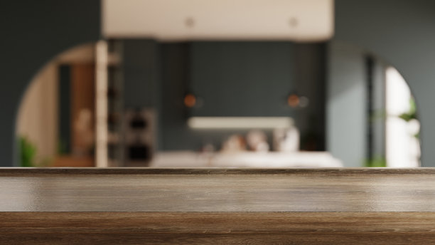 木制桌面在模糊的厨房房间背景，展示了一个现代和时尚的厨房设计与深色橱柜- 3D渲染图片下载