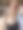特写照片:迷人的红发女子头戴墨镜，看着镜头，手里拿着装有两勺巧克力冰淇淋的华夫蛋筒，正在融化的冰淇淋，游艇在码头，港区背景，焦点在前景图片下载