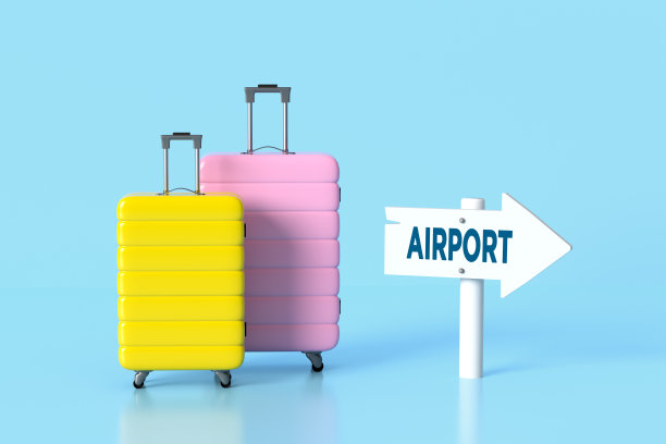 蓝色背景的机场标志指向旅行行李图片下载