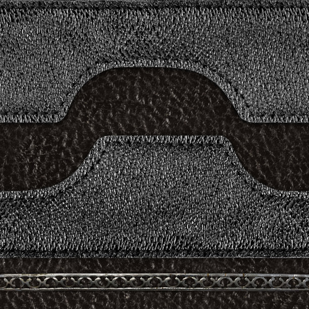 无缝4k照片纹理的黑色皮革修补与皮革华丽的条纹和金属边界。图片下载