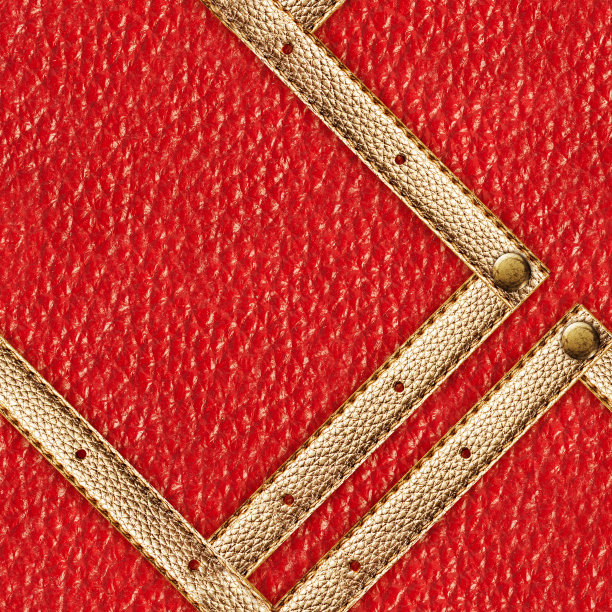 金色带网在红色皮革上的无缝4k照片纹理。图片下载