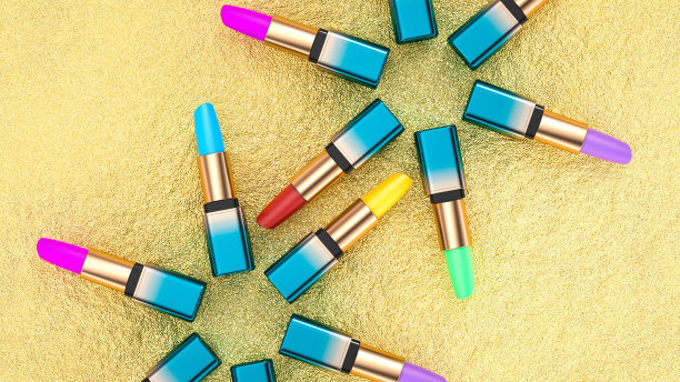 五彩缤纷的口红在奢华的金色纹理背景上排列成星形图案。非常适合化妆品品牌和美容产品的促销。3 d渲染。图片下载