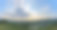 美丽的风景和蓝天。春天的夕阳在村庄上空。有田野和山脉的乡村景观。照片的背景是村庄的景色和阳光。图片下载