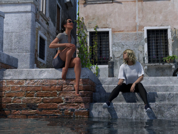 两个女人坐在旧世界的运河旁。图片下载