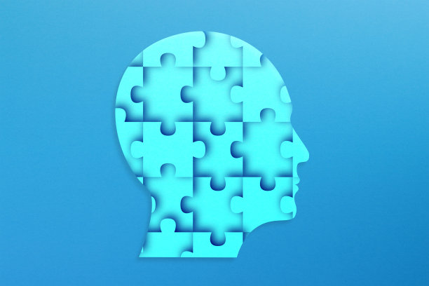 在蓝色背景上用拼图制作的人头图片下载