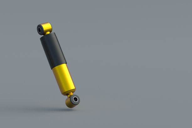 黄色减震器的汽车或摩托车在灰色背景。汽车零配件。汽车悬架的新部件。副本的空间。三维渲染图片下载