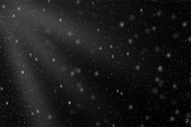 温柔的雪花优雅地降落在黑暗的夜空下，创造了一个宁静的冬季氛围。图片下载