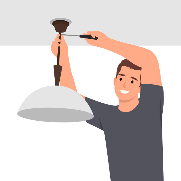 青年电工安装吸顶灯安装电线。图片下载