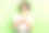 照片中时髦漂亮的女士穿着白色上衣，双臂抱着小纸杯蛋糕，孤立的绿色背景图片下载