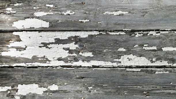 木板白色与灰色，旧油漆剥落，水平在整个框架的顶部视图。背景纹理照片图片下载