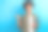年轻的学生男生拿着新设备平板电脑指着空白的空间推广电子商务产品孤立的蓝色背景的照片图片下载