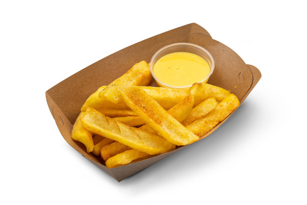 白色背景上的金黄色薯条土豆配上番茄酱。图片下载