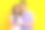 照片肖像迷人的年轻女子男子抱着小房子房地产穿时髦的紫色服装孤立在黄色的背景图片下载