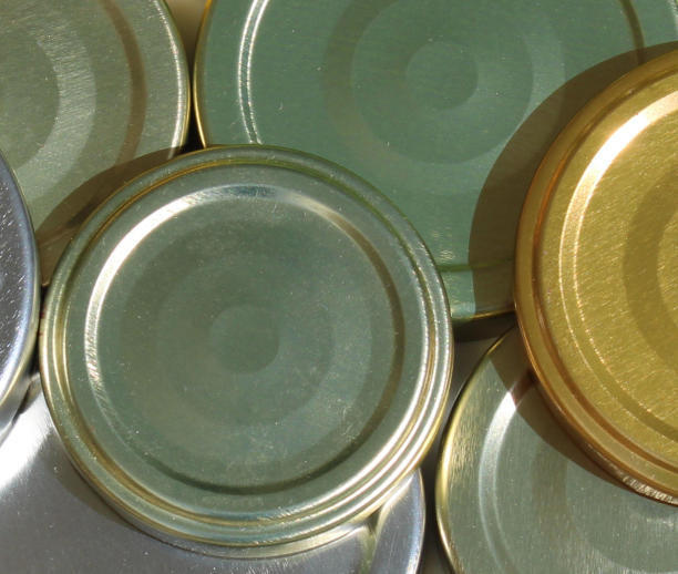 商品有金属盖，金、银、绿闪光盖或原料回收商品图片下载