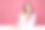 照片黑发女孩触摸下巴坐桌子感觉激情孤立柔和的粉红色背景图片下载