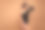 照片中可爱的梦幻女子穿着露肩紧身衣享受运动，空旷的空间孤立的棕色背景图片下载