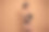 照片中闪亮可爱的女人穿着露肩紧身衣，抚摸着柔软的皮肤，空白的空间孤立的棕色背景图片下载