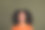 印象深刻的好女人的照片烫发的发型穿着橙色衬衫抬头看在标志空白空间孤立的黑暗卡其色背景图片下载