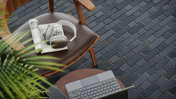 鸟瞰放在石头地板上的木桌子。桌子上有一台笔记本电脑。咖啡杯和手机。3d，渲染，插图，图片下载