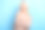 照片广告横幅的退休女士模特穿着时髦的米色毛衣拥抱自己的新鲜衣服孤立在蓝色的背景图片下载