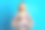 漂亮的年轻人闭上眼睛祈祷冥想穿着套头衫孤立的蓝绿色背景的照片图片下载