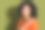 照片中漂亮的年轻女子闭着眼睛碰着肩膀，穿着橙色t恤孤立在卡其色背景上图片下载