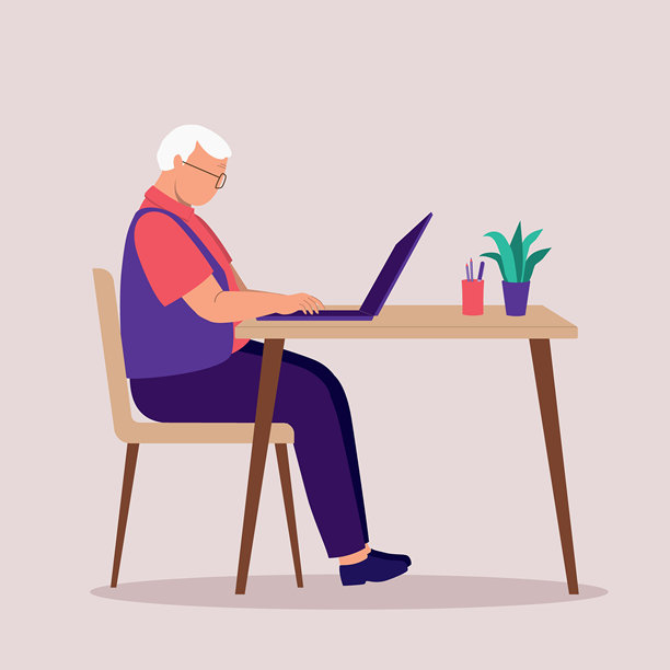 老人坐在办公桌前使用笔记本电脑。笔记本。图片下载