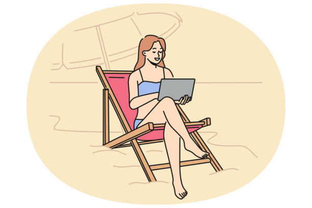 在沙滩上工作的女性自由职业者，坐在躺椅上，膝上放着笔记本电脑，享受着舒适图片下载