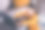 漂亮小女孩的照片肖像坐在地板沙发上网本穿着橙色的衣服现代室内平坦的室内图片下载
