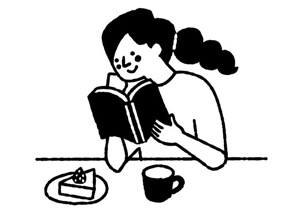 边吃蛋糕边看书的女人图片下载