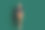 迷人可爱的退休女士穿着时尚的衣服，双手口袋孤立的深绿色背景的全长照片图片下载