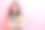惊讶的魅力模特女孩直接手指空白的照片令人难以置信的反应好消息广告孤立在粉红色的背景图片下载