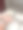 特写照片中，一名无法辨认的女子站在豪华浴室的洗手池前洗手，有肥皂，肥皂泡沫，流动的水龙头，白色大理石浴室柜台，抬高的视野，聚焦于前景图片下载