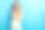 照片的年轻严肃的女学生穿着针织橙色套头衫直接手指空白的空间网站与作业孤立的蓝色背景图片下载