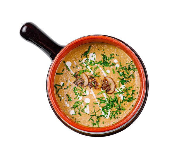 美味的奶油蘑菇汤配以新鲜的香草，在质朴的碗图片下载