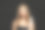 孤立的时尚模特与棕色闪亮的直发型肖像。可爱的女人手里拿着直发棒，黑色的工作室背景图片下载