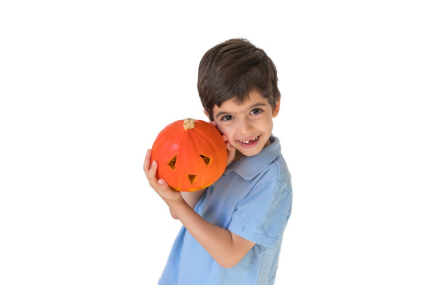 白底万圣节南瓜男孩。节日的概念。不给糖就捣蛋。杰克南瓜灯图片下载