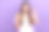 照片的幸运漂亮的女士穿着条纹白色t恤上升拳头玩游戏现代小工具孤立的紫色背景图片下载