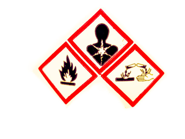 白色背景的化学瓶警告标志。图片下载