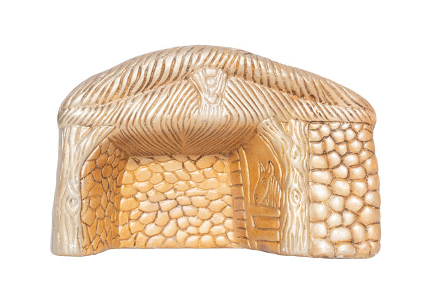 金色陶瓷马槽雕像。耶稣的出生地。简单的马厩结构。图片下载