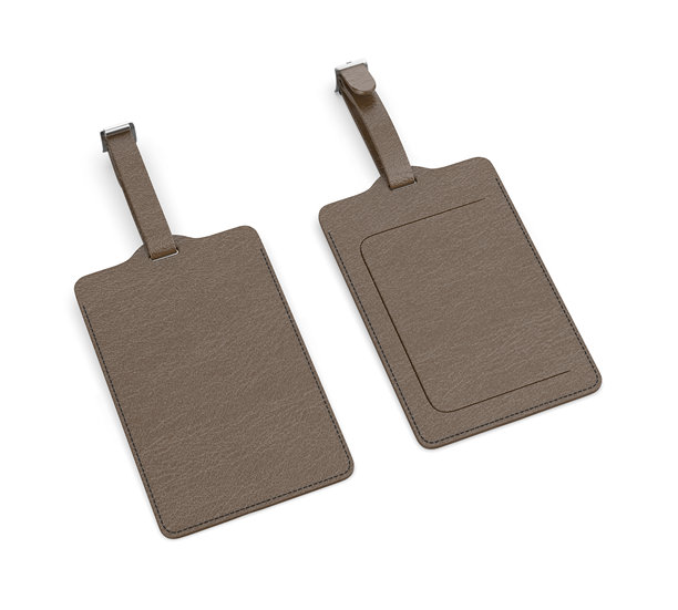 空白皮革旅行行李号码标识标签用于样机展示。图片下载