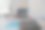 木桌上放着笔记本电脑、房屋钥匙、带笔的剪贴板、房屋模型和绿色树木计算器，房地产概念。特写照片。图片下载