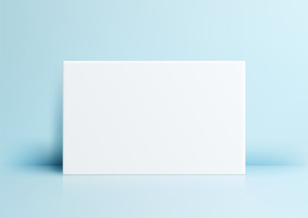浅蓝色墙壁的空白纸张模型，极简设计，适合艺术和品牌展示，完美用于现代办公室或工作室展示图片下载