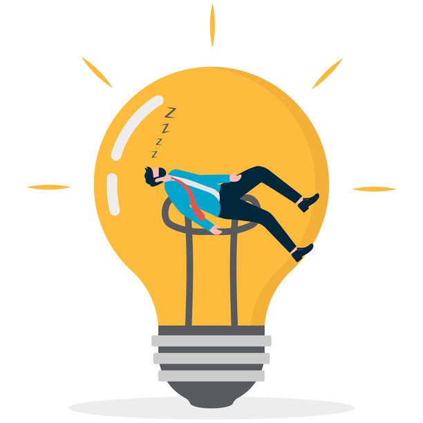 商人在灯泡中休息图片下载