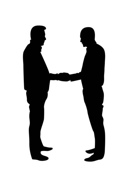 两位商务人士握手的剪影图片下载