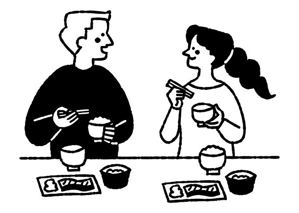 一男一女快乐地享用日本早餐图片下载