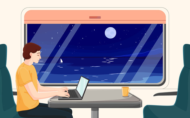 一名男子在夜间列车上使用笔记本电脑工作。图片下载