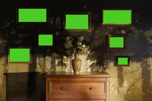 老旧的相框与绿色背景挂在自然风景壁画墙上。3D渲染图片下载
